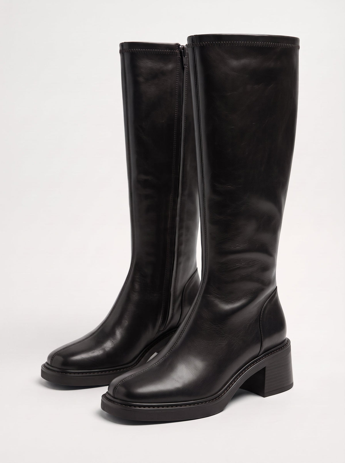 Marina | Botas altas de cuero de punta fina y tacón bajo
